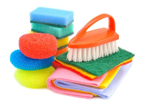Domestic cleaner in Nw6 sanitizing a kitchen and bathroom